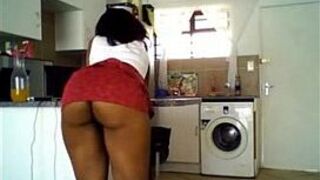 Sexy ebony girl with juicy ass teasing in kitchen porn video